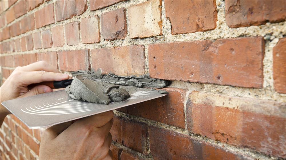 insert new mortar into joint